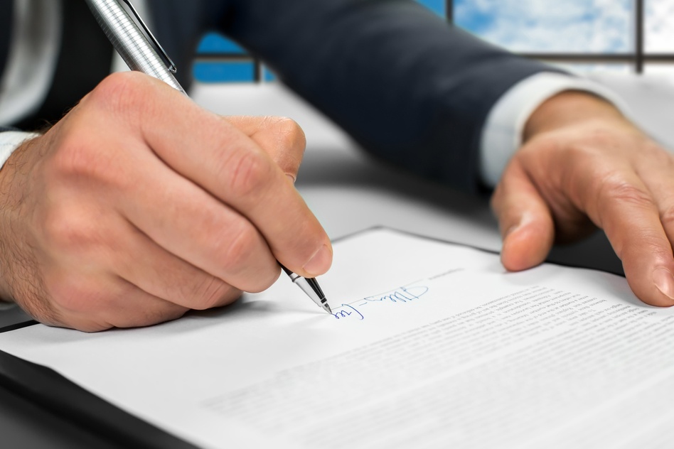 photodune-15360523-notary-signs-papers-at-office-s