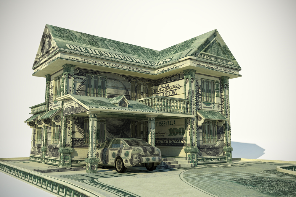 Model of house and car made of money